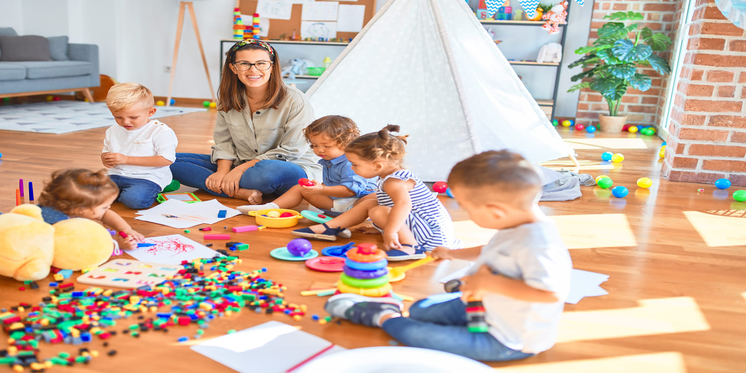 children-playing-with-teacher